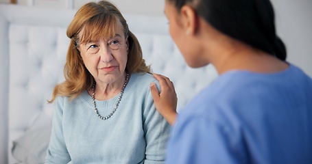 Image showing Comfort, conversation and nurse with a senior woman after a cancer diagnosis in retirement home. Healthcare, consultation and elderly female patient listening to doctor at medical checkup in bedroom.