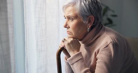 Image showing Thinking, medical and window with old woman and walking stick in bedroom for wellness, retirement and healthcare. Depression, mental health and nursing home with patient with a disability for support