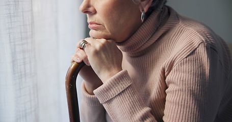 Image showing Thinking, window and hands of old woman and walking stick in bedroom for wellness, retirement and healthcare. Depression, mental health and nursing home with closeup of patient with a disability
