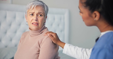 Image showing Empathy, comfort and nurse with a senior woman after a cancer diagnosis in retirement home. Healthcare, consultation and sad elderly female patient listening to doctor at medical checkup in bedroom.