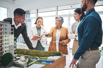 Image showing Creative people, real estate and meeting with 3D model, building project or team startup at office. Group in teamwork discussion for architecture, brainstorming or planning strategy at the workplace