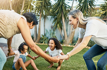 Image showing Grandma, play or mom with children in backyard bonding as a happy family in a fun game with love. Laughing, grandmother or excited kids holding hands with parent or mother in garden outside at home