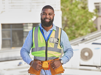 Image showing Black man, portrait and construction, maintenance and engineer with smile and architecture outdoor. African male contractor, professional renovation and urban infrastructure, handyman with tools