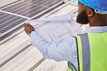 Image showing Man, blueprint or engineer on rooftop or construction site for maintenance or architecture outdoor. Inspection, solar panel renovation or contractor building urban infrastructure with floor plan