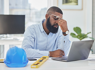 Image showing Architecture, tired and headache with black man and laptop for stress, anxiety or mental health. Engineering, construction and planning with contractor in office for eye strain and project management