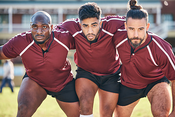 Image showing Portrait, sports and a rugby team training together for a scrum in preparation of a game or competition. Fitness, exercise and teamwork with a male athlete group at an outdoor stadium for practice