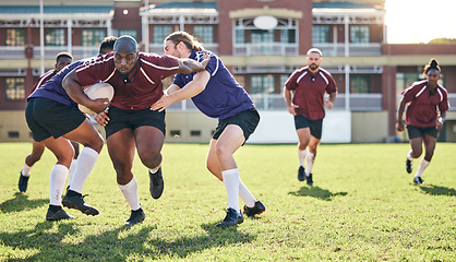 Image showing Rugby, training and tackle with a team on a field together for a game or match in preparation of a competition. Sports, fitness and running with a group of men outdoor on grass for club practice