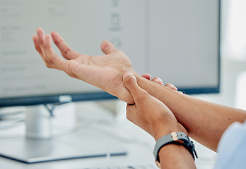 Image showing Hand, work and a person with an injury or arthritis from corporate or typing stress. Closeup, business and an employee with an arm problem, burnout pain or massage after an accident in the workplace