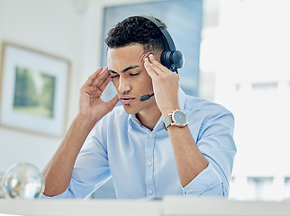 Image showing Business man, call center and headache, pain or stress of communication fail, financial mistake or job fatigue. Tired agent, consultant or sales person with anxiety, depression or migraine in office