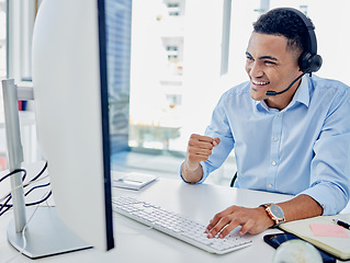 Image showing Call center, man and success at computer for winner, telemarketing celebration and cheers. Happy telecom salesman at desktop to celebrate deal, bonus announcement and achievement of winning with fist