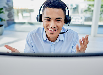 Image showing Call center, customer support and man consultant in the office doing an online consultation. Contact us, crm and professional young male telemarketing agent working with a headset in the workplace.