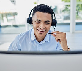 Image showing Call center, business and man consultant in the office doing an online crm consultation. Contact us, ecommerce and professional young male telemarketing agent working with headset in the workplace.