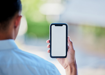 Image showing Phone, screen and mockup in the hand of a person for website marketing on advertising on space. Mobile, logo or branding on a display for contact, communication or networking in ecommerce or sales