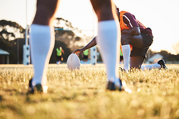 Image showing Legs, ball and rugby, sports on field outdoor with team, target with fitness and train for match. Exercise, athlete people and play game with practice, health and active with grass, skill and player