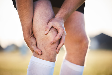 Image showing Knee pain, man with injury and fitness accident, athlete outdoor with cramps and muscle tension. Exercise, sports and male person with hands on leg, health crisis and rugby player with inflammation