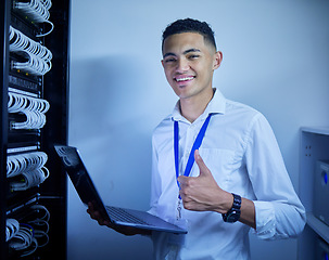 Image showing Man, thumbs up and server room on computer in cybersecurity, IT cables and hardware or data safety solution. Electrician, engineering portrait and laptop with like or good job in software programming