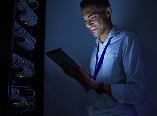 Image showing Man, engineering and tablet in data center or server room inspection, system solution or cybersecurity at night. Happy electrician person on digital tech with power cables, electricity or programming