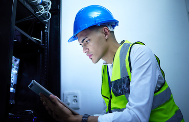 Image showing Man, electrician and tablet for power maintenance, server room or data center upgrade in IT or cybersecurity. Young, engineering person on digital tech for network programming, electricity and cables