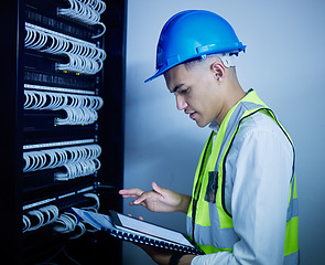 Image showing Man, engineering and tablet for data center maintenance, server room programming or inspection in IT cybersecurity. Electrician or person on typing on digital technology for coding or cables solution