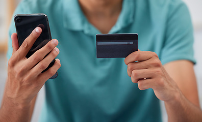 Image showing Hands, credit card and smartphone, man is online shopping and fintech with payment and discount on store website. Male customer, e commerce and internet banking, mobile app and finance with account