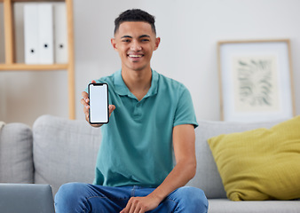 Image showing Phone screen, mockup and smile with portrait of man for networking, social media and space. Internet, show and mobile app with person in living room of home for ui, communication and website offer