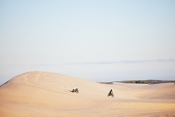 Image showing Desert, sports people and motorbike race, rally or off road marathon travel, journey and driving on competition adventure. Motorcycle speed, extreme challenge or fast racer training on sand dunes