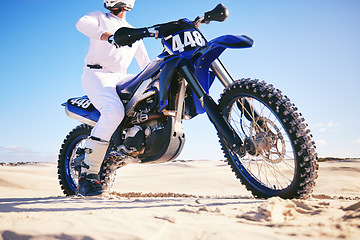 Image showing Sand, sports and man with motorbike in desert for adrenaline, adventure and freedom. Competition, extreme action and male person on bike on dunes for training, exercise and race for driving challenge