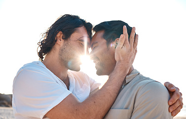 Image showing Love, embrace and sun, gay couple on beach, smile and fun on summer vacation together in Thailand. Sunshine, ocean and island, happy lgbt men hug in nature for on holiday with pride, sea and care.