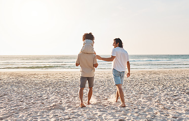 Image showing Beach, LGBT and walking kid, family and enjoy freedom together on travel vacation, holiday or nature freedom. Love, back and gay couple, people or parents bonding with adoption child on shoulder