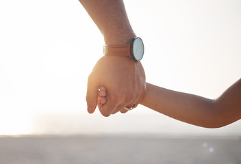 Image showing Parent, father or kid holding hands in park in countryside nature together for support or care. Family, closeup or dad with child bonding or walking on holiday vacation with love, unity or trust