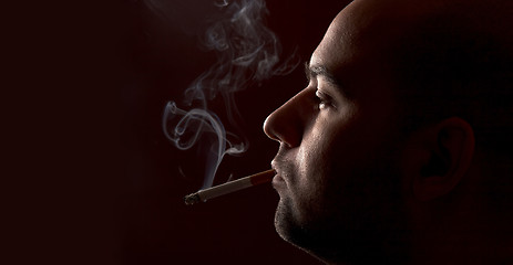 Image showing smoking man