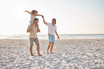 Image showing Gay couple, piggyback and holding hands with family at beach for seaside holiday, support and travel mockup. Summer, vacation and love with men and child in nature for lgbtq, happy and walking