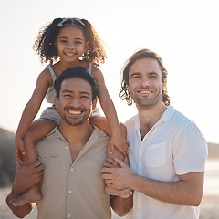 Image showing Gay couple, portrait and smile with family at beach for seaside holiday, support and travel. Summer, vacation and love with men and child in nature for lgbtq, happiness and bonding together