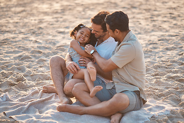 Image showing Gay couple on beach, playing with child and family on holiday picnic together with games and laughing. Love, happiness and sun, lgbt parents on tropical ocean vacation with daughter on island sand.