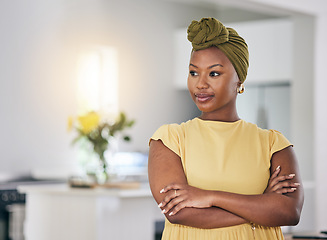 Image showing Thinking, relax and a black woman with arms crossed in a house for a vision, idea or planning. Calm, home and an African girl or person with confidence and motivation in a living room of an apartment