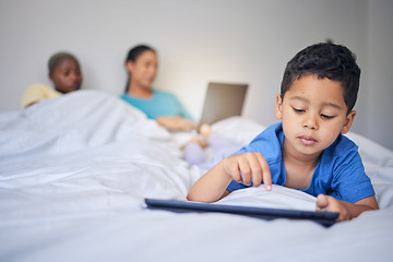 Image showing Children, tablet and education with a family in bed in the morning to relax together at home. Kids, technology and child development with a little boy in the bedroom to play a fun online game