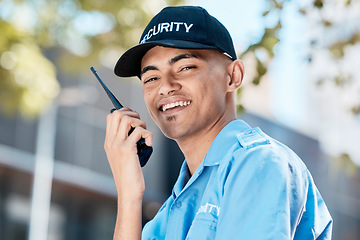 Image showing Walkie talkie, man and security guard in portrait in city, conversation or communication. Safety, face and happy officer on radio to chat on technology in police surveillance service in urban outdoor