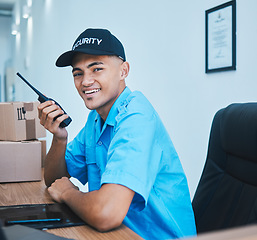 Image showing Walkie talkie, security guard and man in portrait in office in conversation and communication. Safety, face and happy officer on radio at table to chat on technology in police surveillance service