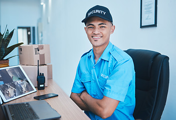 Image showing Security guard man, portrait and smile to monitor with laptop, tablet and arms crossed in control room. Young safety officer, surveillance expert and happy for job, protection service and computer