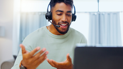 Image showing Video call, black man and work from home, virtual communication or remote client tech support in call center career. Hello, wave of indian person, agent or consultant in living room on laptop talking