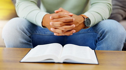 Image showing Prayer, peace and bible with hands of person in living room for worship, spiritual and Christian. Hope, God and belief with closeup of man with holy book at home for religion, praying and gratitude