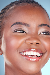 Image showing Face of black woman for skincare, beauty and smile on blue background for wellness, health and spa. Salon aesthetic, dermatology and closeup of happy person in studio with cosmetics, makeup and glow