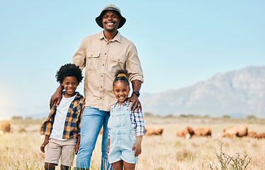 Image showing Family, portrait and people with animals in nature on holiday, travel and adventure in safari. African man and kids outdoor on a field in countryside with a smile on farm trip in Africa with freedom