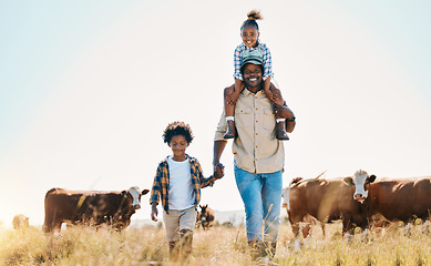 Image showing Family, father and children with animals on a farm outdoor for cattle, travel and holiday. Portrait of black man and kids walking on field with smile for adventure in countryside with cows in Africa