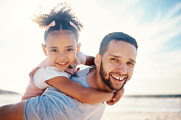 Image showing Portrait, piggyback and father with girl at beach on summer holiday, family vacation or travel together in Colombia. Happy dad carrying young kid at sea for love, tropical freedom or care in sunshine