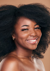 Image showing Portrait, hair care and black woman with beauty, shine and wellness on brown studio background. Growth, person or African model with texture, afro or cosmetics with aesthetic, face or smile with glow