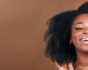 Image showing Mockup, closeup and black woman with hair care, smile or cosmetics on a brown studio background. Half, African model or person with aesthetic, salon treatment for afro or wellness with natural beauty