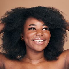 Image showing Thinking, black woman and hair care for afro, smile and natural beauty on a brown studio background. Growth, hairstyle and African model with cosmetics after salon treatment, wellness and aesthetic
