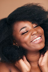 Image showing Smile, black woman and hair care for afro, beauty and cosmetics on a brown studio background. Growth, hairstyle or African model with makeup after natural treatment, texture or shine with wellness