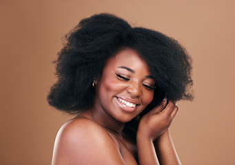 Image showing Natural, black woman and hair care with beauty, smile and luxury on a brown studio background. Afro, hairstyle and African model with mockup space, aesthetic and shine with salon treatment and growth